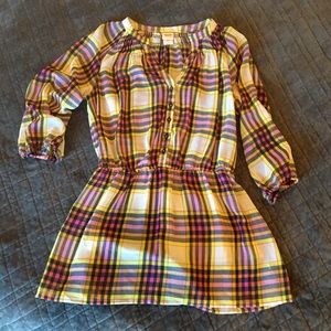 Tunic with plaid design.